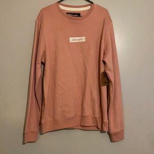 Long sleeve thick shirt. Never worn with tags